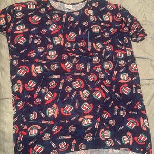 LuLaRoe Navy and Red Patriotic Top fits size Small or Large sized person.